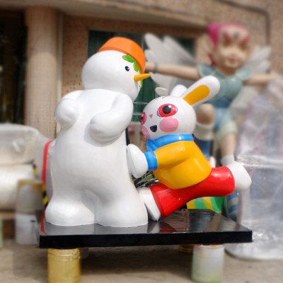 玻璃钢卡通雪人与兔雕塑